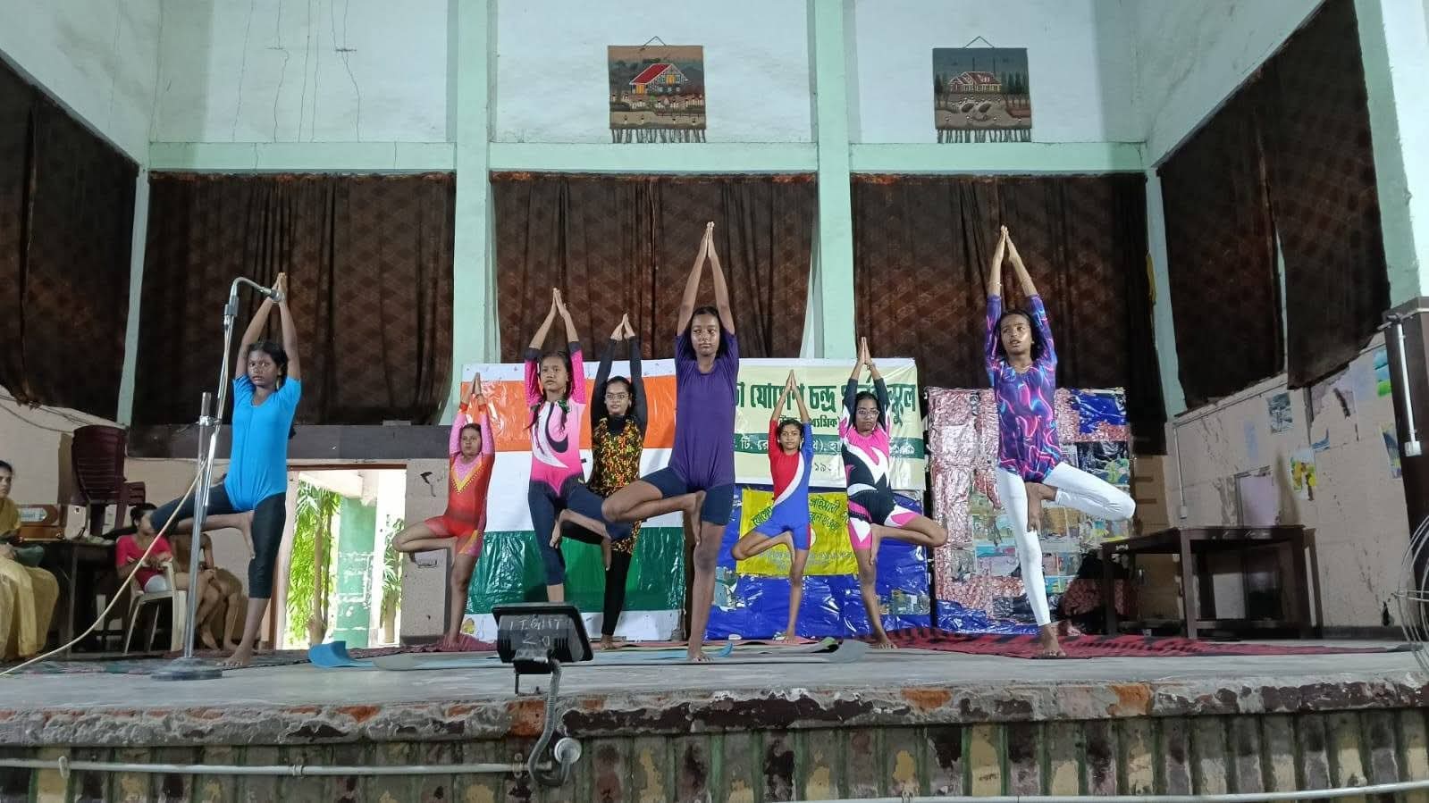 Students practicing yoga